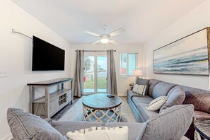 TV - Coastal condo with open layout, nautical theme, smart TVs, beach access, & AC (Gulf Shores)