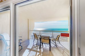 Outdoor dining - Beach/Gulf-front condo with water views, on-site pool, & private balcony (Gulf Shores)