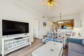 TV, offices - Gulf view condo with 2 pools, lazy river, hot tub, sauna, gym & beach access (Gulf Shores)