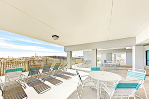 Outdoor dining - Convenient condo with balcony, beach views, pool, & central AC (Gulf Shores)