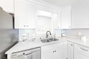 Fridge, microwave, oven, stovetop - Beachfront house with balcony, deck, ocean view, central AC, & washer/dryer (Gulf Shores)