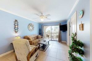 TV, offices - 2nd-floor condo near the beach with balcony, outdoor pool, partial beach views (Gulf Shores)