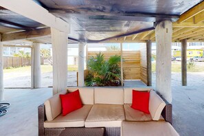 Terrace/patio - Dog-friendly beach stay with a balcony, grill, outdoor bar, swing, W&D, & AC (Gulf Shores)