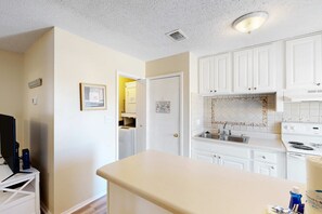 Fridge, microwave, oven, stovetop - Inviting condo with Gulf view, balcony, pool, full kitchen, & W/D (Gulf Shores)