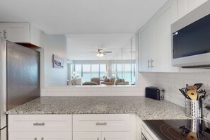 Fridge, microwave, oven, stovetop - Beachfront condo with Gulf views, pool, washer,dryer, & central AC (Gulf Shores)
