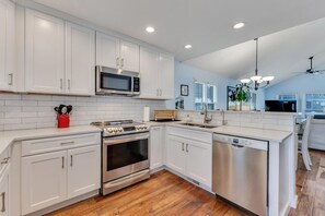Fridge, microwave, oven, stovetop - Kraken - Spacious 4 Bedroom Home with Private Beach Access (Kure Beach)