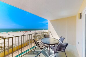 Outdoor dining - 2nd-floor Gulf-front condo with amazing beach views, balcony, outdoor pool & W/D (Gulf Shores)