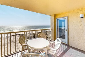 Outdoor dining - Fourth-floor Gulf-front getaway with balcony, views, central AC, & outdoor pool (Gulf Shores)