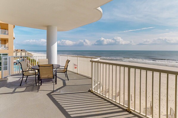 Outdoor dining - Beachfront corner condo with amazing Gulf views, balcony, pools & hot tubs (Gulf Shores)