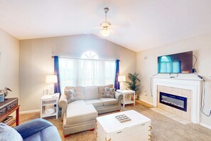 TV, fireplace, offices - Second floor condo with pool & hot tub access, WiFi, private W&D, and central AC (Gulf Shores)