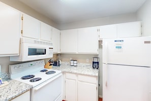 Fridge, microwave, oven, stovetop - Second floor condo with pool & hot tub access, WiFi, private W&D, and central AC (Gulf Shores)