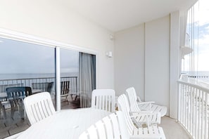 Terrace/patio - Serene Gulf-front condo with pool, hot tub, sauna, washer/dryer, & central AC (Gulf Shores)