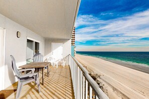 Outdoor dining - Gulf-front condo with beach views, balcony, central AC & pool (Gulf Shores)