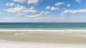 A beach with clear skies and ocean waves. - Gulfview condo wbalcony & resort amenities - shared pools, hot tubs, tennis (Gulf Shores)