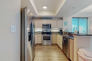 Fridge, microwave, oven, stovetop - Beachview condo with shared indoor and outdoor pool, beach acces, and WIFI (Gulf Shores)