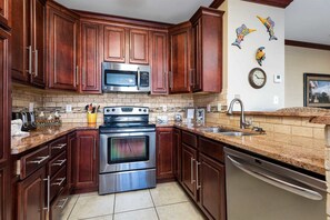 Fridge, microwave, oven, stovetop - Ground-Floor Condo near the Beach w/Private Patio, Shared Pool, and Central A/C (Orange Beach)