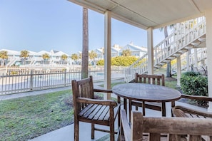 Outdoor dining - Ground-Floor Condo near the Beach w/Private Patio, Shared Pool, and Central A/C (Orange Beach)