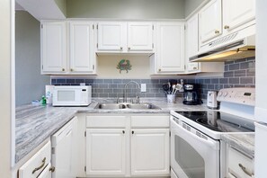Fridge, microwave, oven, stovetop - Beautiful home steps from beach with pool & central AC (Gulf Shores)