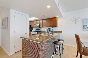 Fridge, microwave, oven, stovetop - Beachfront condo with pool, private balcony, & washer and dryer (Gulf Shores)