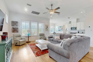 TV, offices - Sunny coastal getaway with shared pool, firepit, putting green & short beach walk (Orange Beach)