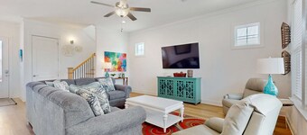Sunny coastal getaway with shared pool, firepit, putting green & short beach walk