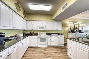 Fridge, microwave, oven, stovetop - Beachfront condo w/ private balcony & shared pools, gym & sauna (Orange Beach)