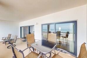 Outdoor dining - Beachfront condo with shared Gulf front outdoor pool, heated indoor pool, & sauna (Orange Beach)