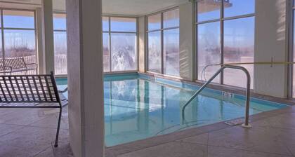 Condo Steps from the Beach with Balcony, WiFi, Central AC & Shared Pools