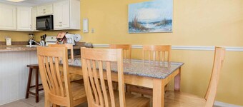 Condo Steps from the Beach with Balcony, WiFi, Central AC & Shared Pools