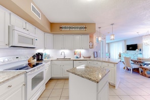 Fridge, microwave, oven, stovetop - Large beachfront condo with views from private balcony and shared hot tub & pool (Orange Beach)
