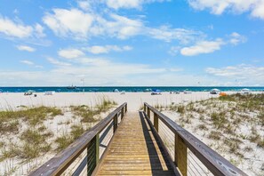 On the beach - Gulf front condo with pool, beach access, and wrap around balcony (Orange Beach)