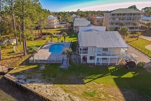 Exterior - Ground-floor condo with waterfront pool, private patio, AC, & W/D (Orange Beach)