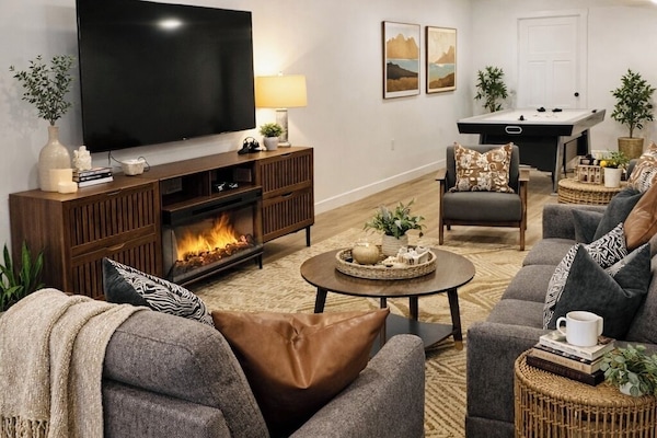 Spacious Rec Room features: 75in TV, fireplace, two play tables and much more