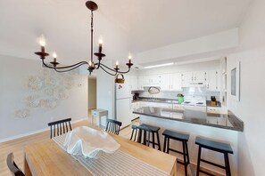 Fridge, microwave, oven, stovetop - Cozy condo with balcony, pool, & boat launch on the bayou - near the beach (Orange Beach)