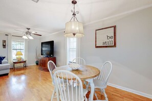 Dining - Dreamy island home with outdoor kitchen, gas grill, firepit, WiFi & lush yard (Dauphin Island)