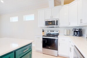 Fridge, microwave, oven, stovetop - Beautiful beach house with Gulf views, covered deck, central AC, and free WiFi (Dauphin Island)