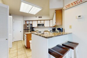 Fridge, microwave, oven, stovetop - Gulf-Front Beach Condo w/Balcony, Shared Pool, Hot Tub, A/C, Views, & Gym (Orange Beach)