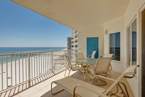 Outdoor dining - Family-friendly, Gulf-front condo with private balcony and resort style pools, sauna and gym (Orange Beach)