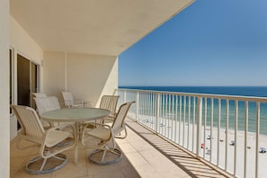 Outdoor dining - Family-friendly, Gulf-front condo with private balcony and resort style pools, sauna and gym (Orange Beach)
