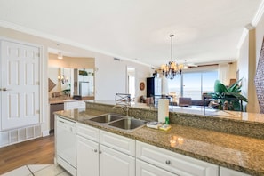 Fridge, microwave, oven, stovetop - Gulf-front condo with balcony, central AC, pools, hot tubs & beach access (Orange Beach)