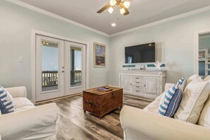 TV, offices - Waterfront home with private grill, dock, and washer & dryer (Dauphin Island)