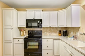 Fridge, microwave, oven, stovetop - Snowbird-friendly condo with AC, outdoor pool, tennis & hot tub - near the beach (Gulf Shores)