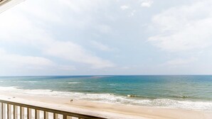 A beach view with a balcony overlooking the ocean. - 8th-floor beachfront condo with Gulf view, waterfront pool, & balcony (Gulf Shores)
