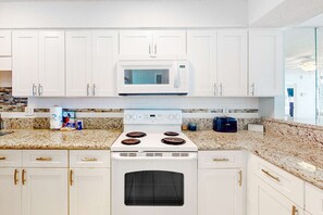 Fridge, microwave, oven, stovetop - 8th-floor beachfront condo with Gulf view, waterfront pool, & balcony (Gulf Shores)