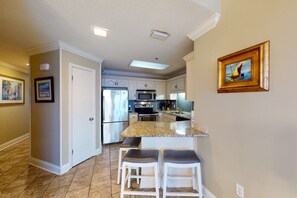 Fridge, microwave, oven, stovetop - Beachfront condo with Gulf views, balcony, pools, hot tubs & sports courts (Orange Beach)