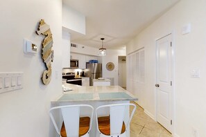 Fridge, microwave, oven, stovetop - Gulf-front corner condo with great deck, pools & hot tub (Orange Beach)