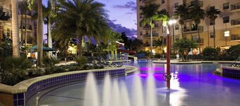 Relax at our Palm Tree secluded Resort with a poolside bar and waterslide