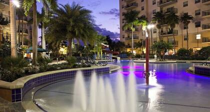 Relax at our Palm Tree secluded Resort with a poolside bar and waterslide
