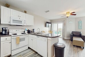 Fridge, microwave, oven, stovetop - Gulf Coast condo with a pool, gym, boat launch, & nearby beach access (Orange Beach)