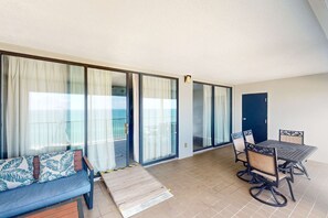 Outdoor dining - Beachfront corner condo with stunning Gulf views, pools, hot tub & fitness center (Orange Beach)